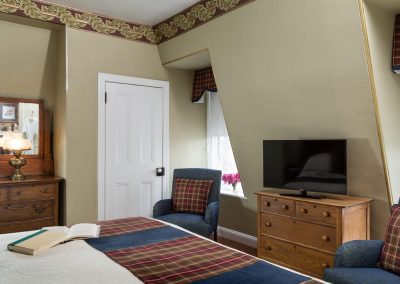 Crown Prince Guestroom Bedroom with TV, Closet, Antique Dresser and two beautiful windows