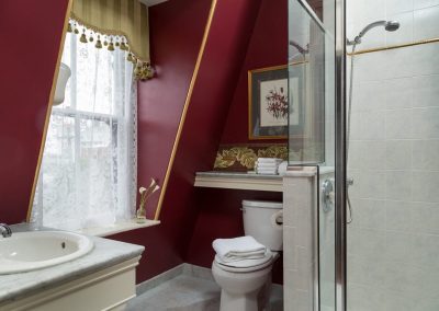 Crown Prince Guestroom Master Bath with step-in shower and marble top sink counter