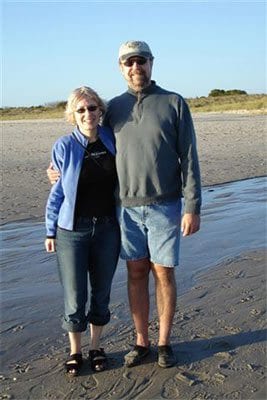 Guest Photos- Couple standing on Cape May beach sand.