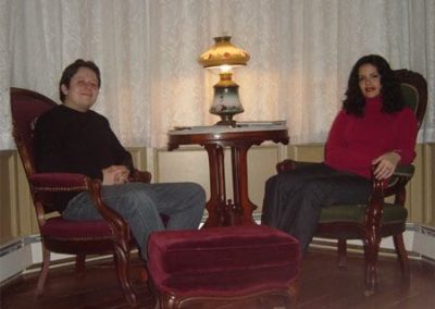 Guest Photos- Couple relaxing in chairs at Queen Victoria Bnb