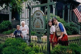 Guest Photos- Family standing next to the Queen Victoria sign.