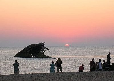 Cape May Activities- shipwreck sticking out of water at sunset.